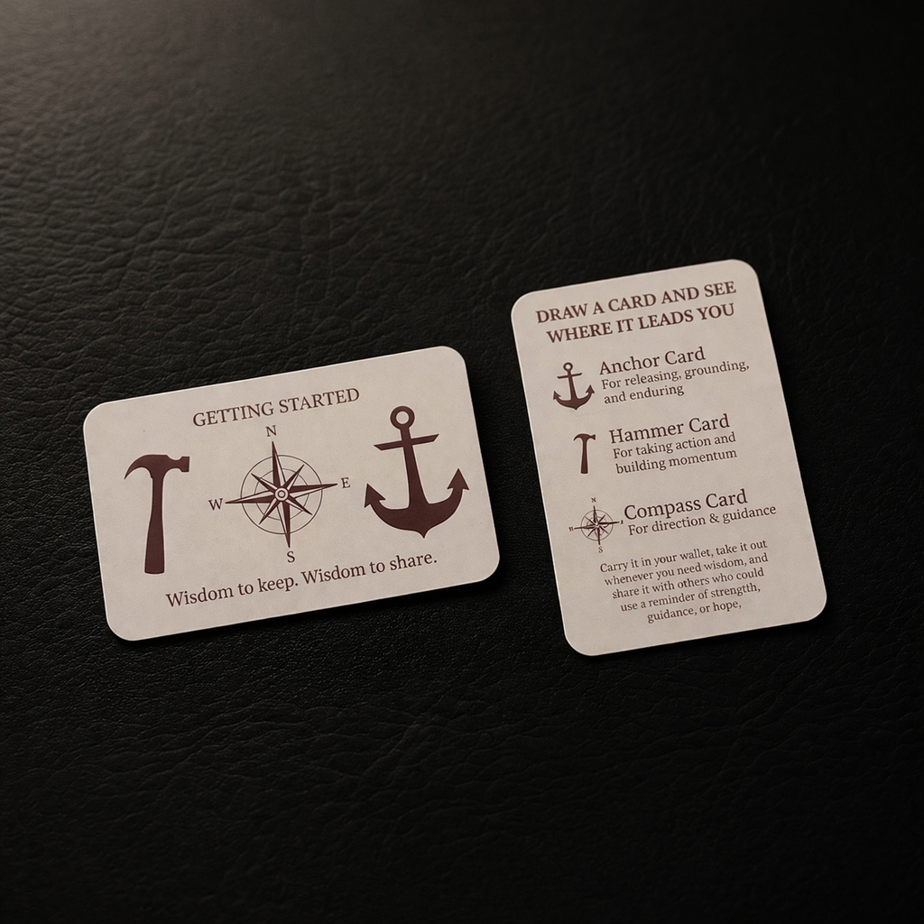 Wallet Wisdom cards spread on dark leather background