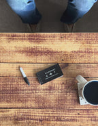 Wallet Wisdom System in action — writing on a wisdom card with a Sharpie alongside the included jotter