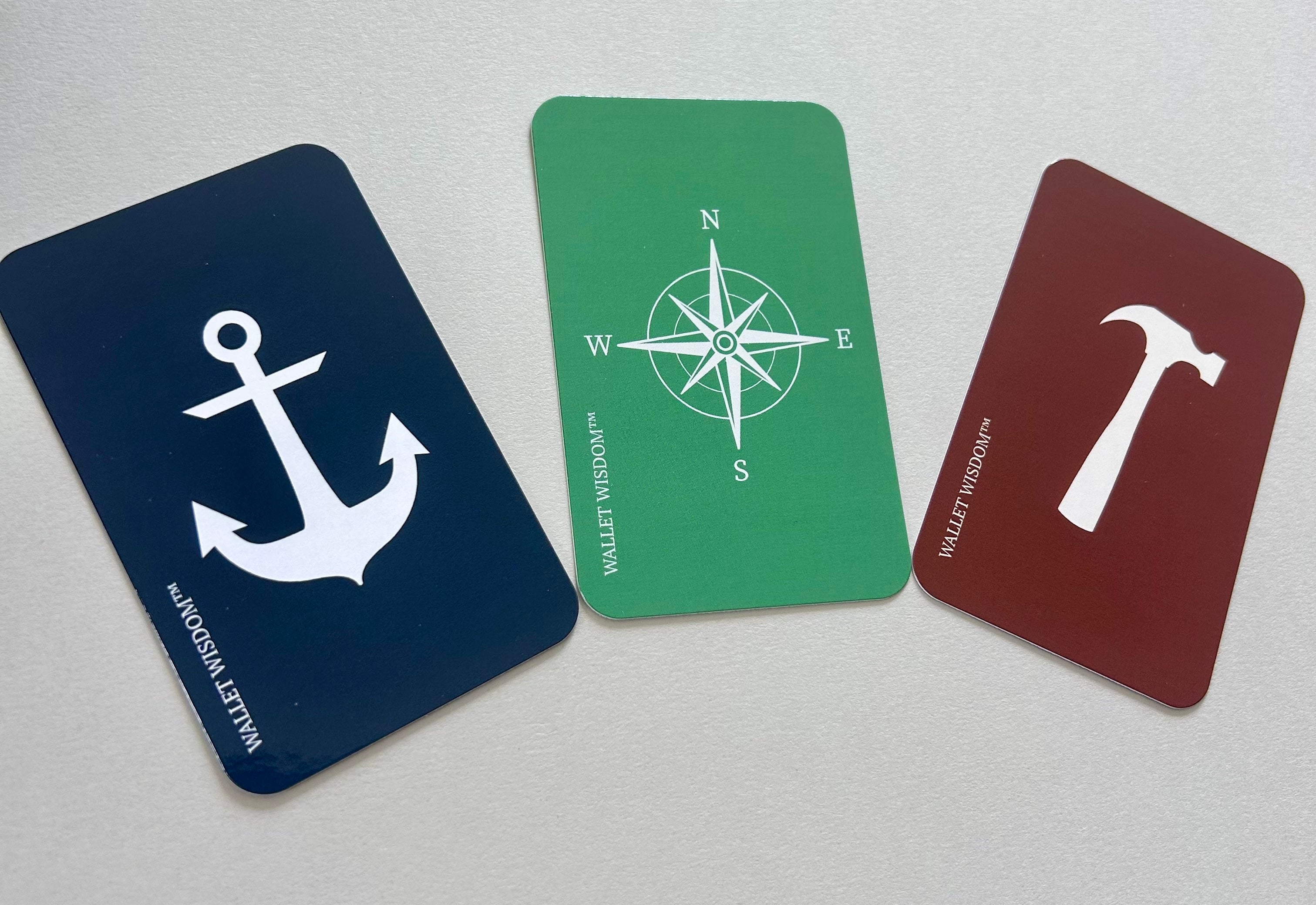 Wallet Wisdom Anchor Compass and Hammer cards side by side showing all three card types in navy green and red